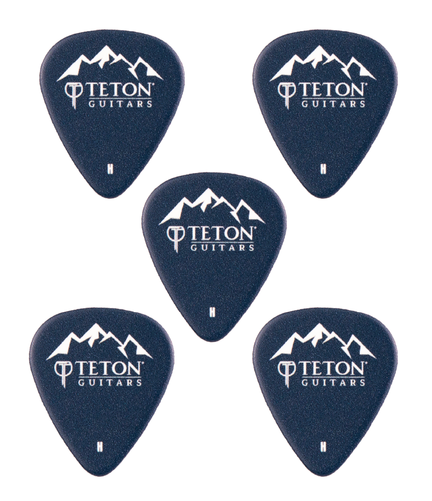 Five dark blue guitar picks with Teton Guitars branding on a white background