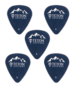 Five dark blue picks with Teton Guitars branding on a white background